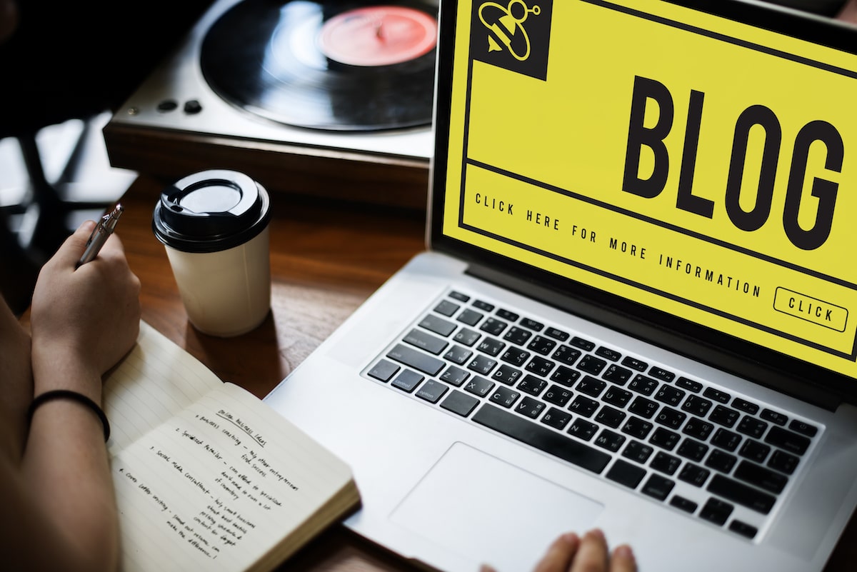 Laptop showing title BLOG representing the principles on how to optimize blog posts for SEO
