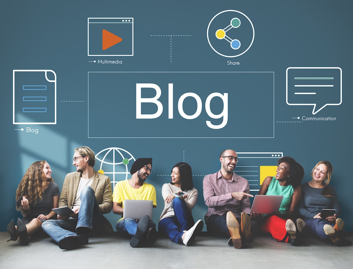 People sitting and above their head are the graphics - elements of the blog post representing how to optimize blog posts for SEO