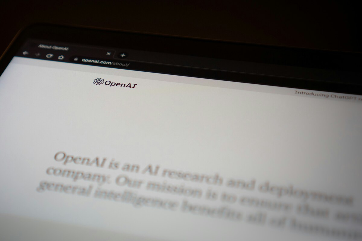 Close shot of a screen showing ChatGPTs OpenAI web page